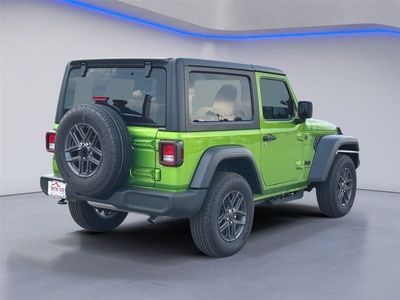 2026 Jeep Wrangler — rear three-quarter view