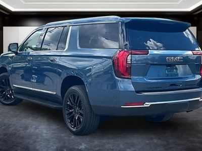 2026 GMC Yukon XL — rear three-quarter view