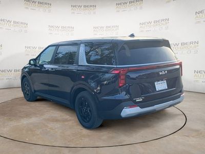 2026 Kia Carnival — rear three-quarter view