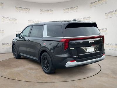 2026 Kia Carnival — rear three-quarter view