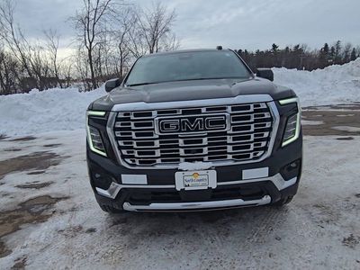 2026 GMC Yukon XL — rear three-quarter view