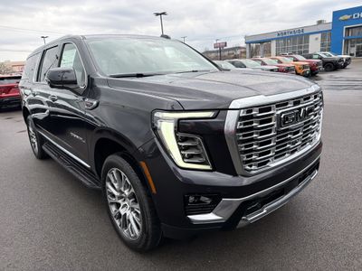 2026 GMC Yukon XL — rear three-quarter view