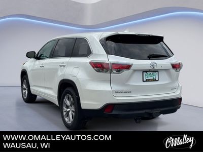 2015 Toyota Highlander — rear three-quarter view
