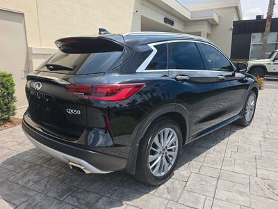 2024 INFINITI QX50 — rear three-quarter view