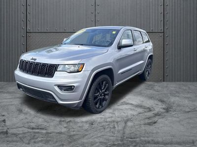2018 Jeep Grand Cherokee — rear three-quarter view