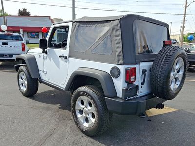 2016 Jeep Wrangler — rear three-quarter view