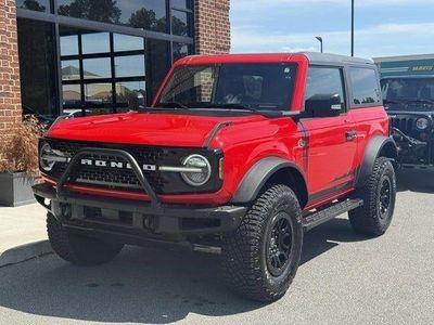 2022 Ford Bronco Wildtrak in Race Red — front three-quarter view