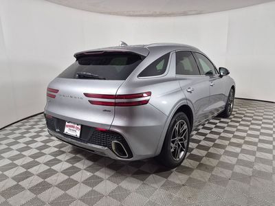 2024 Genesis GV70 — rear three-quarter view
