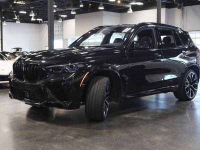 2022 BMW X5 M — rear three-quarter view