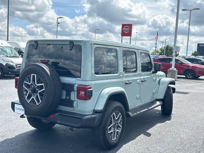2024 Jeep Wrangler — rear three-quarter view