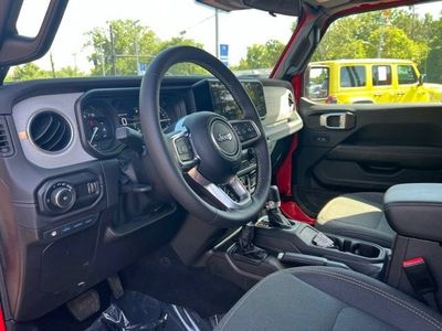 2025 Jeep Wrangler — rear three-quarter view