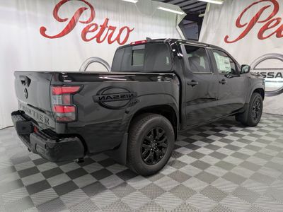2026 Nissan Frontier — rear three-quarter view