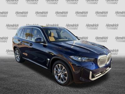 2026 BMW X5 xDrive50e — side profile view