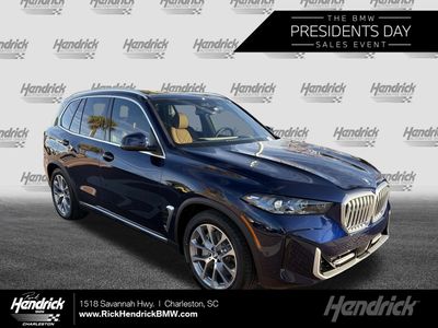 2026 BMW X5 xDrive50e — front three-quarter view