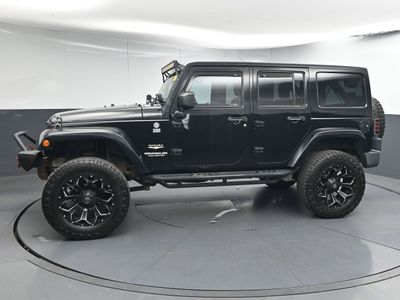 2012 Jeep Wrangler Unlimited Sahara SUV - Photo 7
