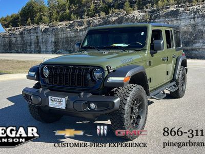 2024 Jeep Wrangler — rear three-quarter view