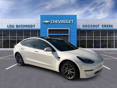 2023 Tesla Model 3 — side profile view