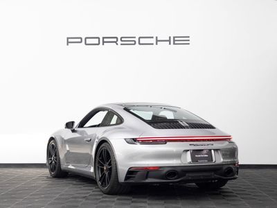 2024 Porsche 911 — rear three-quarter view