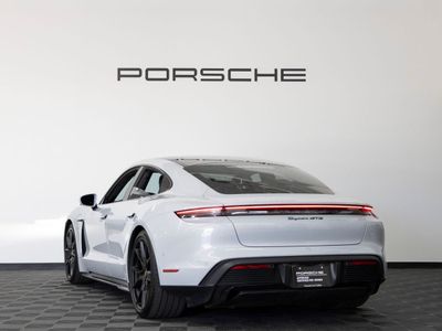 2024 Porsche Taycan — rear three-quarter view