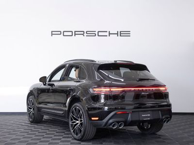 2026 Porsche Macan — rear three-quarter view