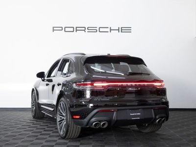 2026 Porsche Macan — rear three-quarter view