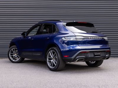 2025 Porsche Macan — rear three-quarter view