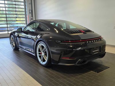 2025 Porsche 911 — rear three-quarter view