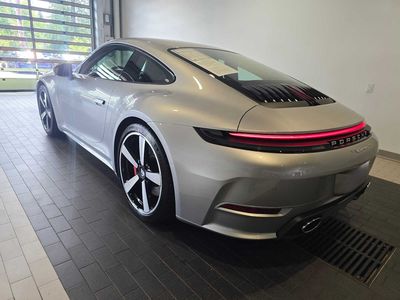 2025 Porsche 911 — rear three-quarter view