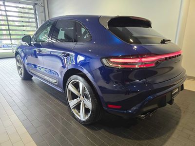 2026 Porsche Macan — rear three-quarter view