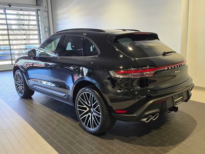 2026 Porsche Macan — rear three-quarter view