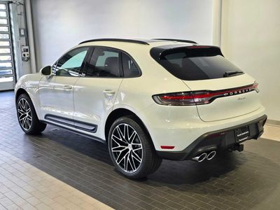 2026 Porsche Macan — rear three-quarter view