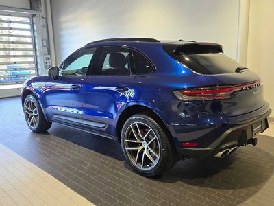 2026 Porsche Macan — rear three-quarter view