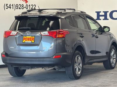 2015 Toyota RAV4 — rear three-quarter view
