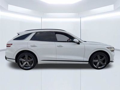 2022 Genesis GV70 — rear three-quarter view