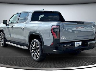2026 GMC Sierra EV — rear three-quarter view