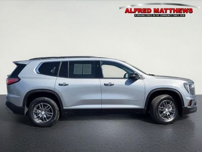 2025 GMC Acadia — rear three-quarter view