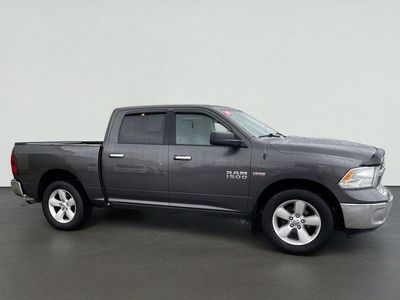 2018 RAM 1500 SLT in Granite Crystal Metallic Clearcoat — front three-quarter view