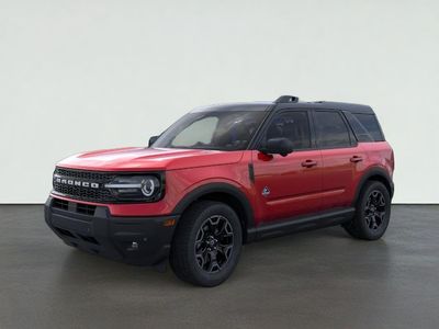 2026 Ford Bronco Sport Outer Banks in Ruby Red Metallic Tinted Clearcoat — front three-quarter view