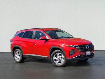 2023 Hyundai TUCSON SEL in Calypso Red — front three-quarter view