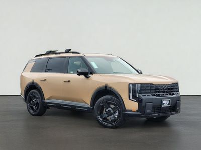 2027 Kia TELLURIDE X-LINE SX-PRESTIGE in Terrain Brown Matte — front three-quarter view