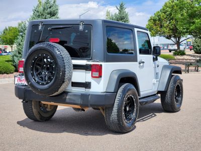 2018 Jeep Wrangler JK — rear three-quarter view