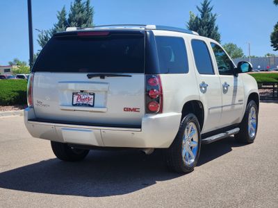 2014 GMC Yukon — rear three-quarter view