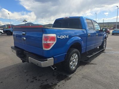 2014 Ford F-150 — rear three-quarter view