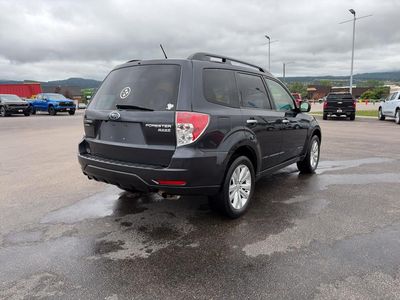2013 Subaru Forester — rear three-quarter view