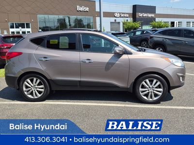 2013 Hyundai Tucson — side profile view