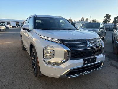 2025 Mitsubishi Outlander PHEV — rear three-quarter view