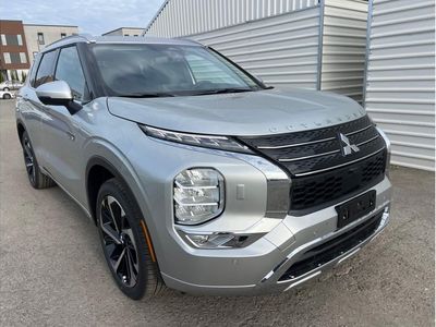2025 Mitsubishi Outlander PHEV — rear three-quarter view