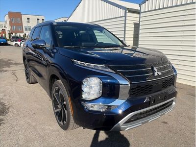 2025 Mitsubishi Outlander PHEV — rear three-quarter view
