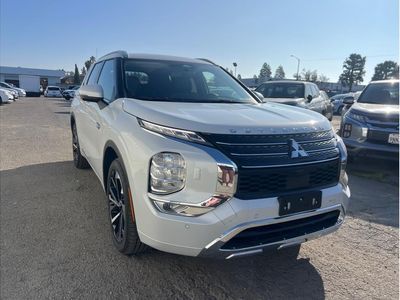 2025 Mitsubishi Outlander PHEV — rear three-quarter view