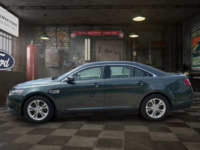 2016 Ford Taurus — rear three-quarter view